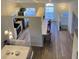 Open kitchen with island and stainless steel appliances at 4220 Players Pl # 2221, Sarasota, FL 34238