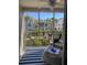 Relaxing lanai with patio furniture and view of community at 4220 Players Pl # 2221, Sarasota, FL 34238