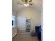 Bright office space with a comfortable sitting area and ceiling fan at 4220 Players Pl # 2221, Sarasota, FL 34238