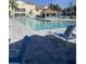 Large, refreshing community pool with plenty of lounge chairs at 4220 Players Pl # 2221, Sarasota, FL 34238