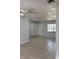 Spacious living area with neutral walls and tile flooring at 5111 Eldorado Dr, Tampa, FL 33615