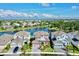 Community of homes near the water with lush landscaping at 5221 Wishing Arch Dr, Apollo Beach, FL 33572