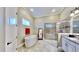 Bathroom with a large soaking tub and a walk-in shower at 5221 Wishing Arch Dr, Apollo Beach, FL 33572