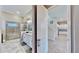 Elegant bathroom with double vanity, large shower, and soaking tub at 5221 Wishing Arch Dr, Apollo Beach, FL 33572
