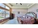 Spacious bedroom with water views, plush bedding and large windows at 5221 Wishing Arch Dr, Apollo Beach, FL 33572