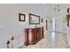 Bright entryway with wood floors and a console table at 5221 Wishing Arch Dr, Apollo Beach, FL 33572