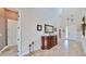 Bright entryway with high ceilings and wood-look tile flooring at 5221 Wishing Arch Dr, Apollo Beach, FL 33572