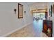Open entryway with views to the living room and backyard at 5221 Wishing Arch Dr, Apollo Beach, FL 33572