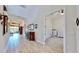 Spacious entryway with views into living room and home office at 5221 Wishing Arch Dr, Apollo Beach, FL 33572