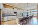 Spacious kitchen with granite countertops, stainless steel appliances, and white cabinets at 5221 Wishing Arch Dr, Apollo Beach, FL 33572