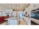 Modern kitchen with granite island and stainless steel appliances at 5221 Wishing Arch Dr, Apollo Beach, FL 33572