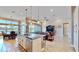 Open floor plan kitchen and living area with water views at 5221 Wishing Arch Dr, Apollo Beach, FL 33572