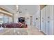 Living area with hardwood floors, built-in entertainment center, and water views at 5221 Wishing Arch Dr, Apollo Beach, FL 33572
