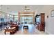 Spacious living room with leather sofa and water views at 5221 Wishing Arch Dr, Apollo Beach, FL 33572