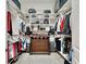 Large walk-in closet with ample shelving and hanging space at 5221 Wishing Arch Dr, Apollo Beach, FL 33572