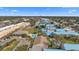 Wide aerial view of community, showing multiple buildings and pools at 6250 7Th W Ave # 6250, Bradenton, FL 34209