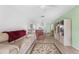 Living room with a beige couch and view of the dining area at 6250 7Th W Ave # 6250, Bradenton, FL 34209