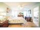 Main bedroom with carpeted floor, dresser, and desk at 8015 Willow Brook Dr, Spring Hill, FL 34606