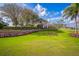 Elegant community clubhouse with landscaping and festive decor at 8015 Willow Brook Dr, Spring Hill, FL 34606