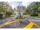 Gated entrance to community with guardhouse and landscaping at 8015 Willow Brook Dr, Spring Hill, FL 34606