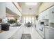 Bright kitchen with white appliances and ample counter space at 8015 Willow Brook Dr, Spring Hill, FL 34606