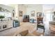 Spacious living room with carpeting, fireplace, and ample natural light at 8015 Willow Brook Dr, Spring Hill, FL 34606