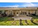 Private patio with pavers and lush green landscaping at 8015 Willow Brook Dr, Spring Hill, FL 34606