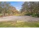 Shuffleboard courts nestled in a shady, wooded area of the community at 8015 Willow Brook Dr, Spring Hill, FL 34606