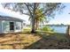 Serene backyard oasis backing to a peaceful lake at 12417 84Th Way, Largo, FL 33773