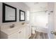 Bathroom with double vanity and shower/tub combo at 12417 84Th Way, Largo, FL 33773