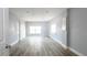 Spacious bedroom with hardwood floors and two windows at 12417 84Th Way, Largo, FL 33773
