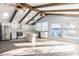 Bright kitchen with stainless steel appliances, island, and vaulted ceiling with skylights at 12417 84Th Way, Largo, FL 33773