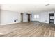 Large living area with tile floors, and barn door at 12417 84Th Way, Largo, FL 33773