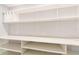 White shelving unit with extra counter space at 12417 84Th Way, Largo, FL 33773