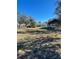 Large backyard with mature trees and open space at 14039 Angle Rd, Hudson, FL 34669