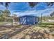 Blue house exterior with shed and carport at 1446 Osceola Hollow Rd, Odessa, FL 33556