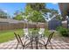 Backyard patio with seating and brick pavers at 15111 Verona Ave, Clearwater, FL 33760