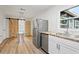 Updated kitchen with stainless steel appliances and wood countertops at 15111 Verona Ave, Clearwater, FL 33760