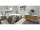Cozy main bedroom filled with natural light from the large window at 15111 Verona Ave, Clearwater, FL 33760