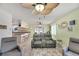 Open living room with a view into the kitchen and dining area at 1719 S Pebble Beach Blvd, Sun City Center, FL 33573