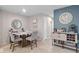 Dining room with gray chairs and a marble top table at 1814 W Palms Dr, Port Charlotte, FL 33953