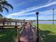 Wooden access dock leading to the lake at 2281 Lake Arbor Blvd, Clearwater, FL 33763