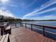 Lakefront wooden dock with bench seating at 2281 Lake Arbor Blvd, Clearwater, FL 33763