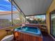 Screened patio with hot tub, ready for relaxation at 2281 Lake Arbor Blvd, Clearwater, FL 33763