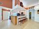 Stylish open-concept living space with a modern kitchen and seamless access to the home's entrance at 2281 Lake Arbor Blvd, Clearwater, FL 33763