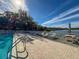 Relaxing community pool area with lake view at 2281 Lake Arbor Blvd, Clearwater, FL 33763