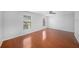 Bright bedroom with hardwood floors and dual windows at 2308 Long Green Ct, Valrico, FL 33596