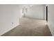 Bright bedroom featuring neutral tones, carpeted floors, and ample natural light from the windows at 2679 Sabal Springs Cir # 203, Clearwater, FL 33761
