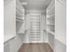 A closet with white shelving at 2679 Sabal Springs Cir # 203, Clearwater, FL 33761