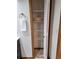 Bathroom linen closet with wire shelving at 3536 Countrybrook Ln # 13, Palm Harbor, FL 34684